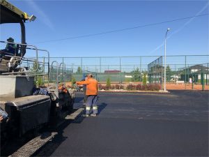 Работы по асфальтированию улиц в коттеджном поселке Малиновые вечера